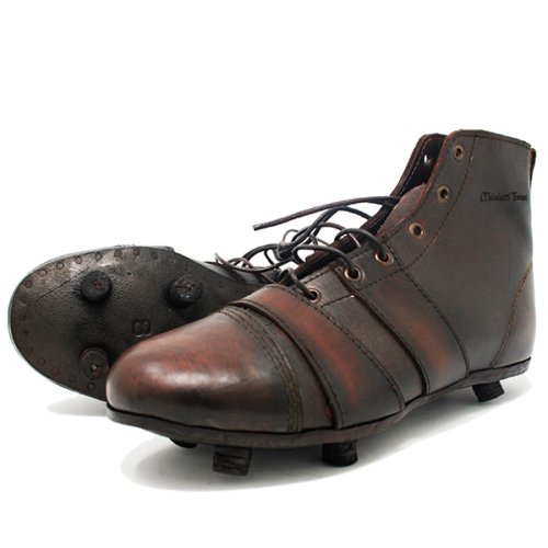 Detalhe de botas de futebol vintage do modelo