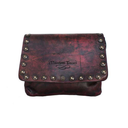 Shines on the front of the wine-colored clutch